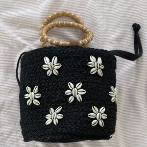 Black Woven Handbag with Shell Accents